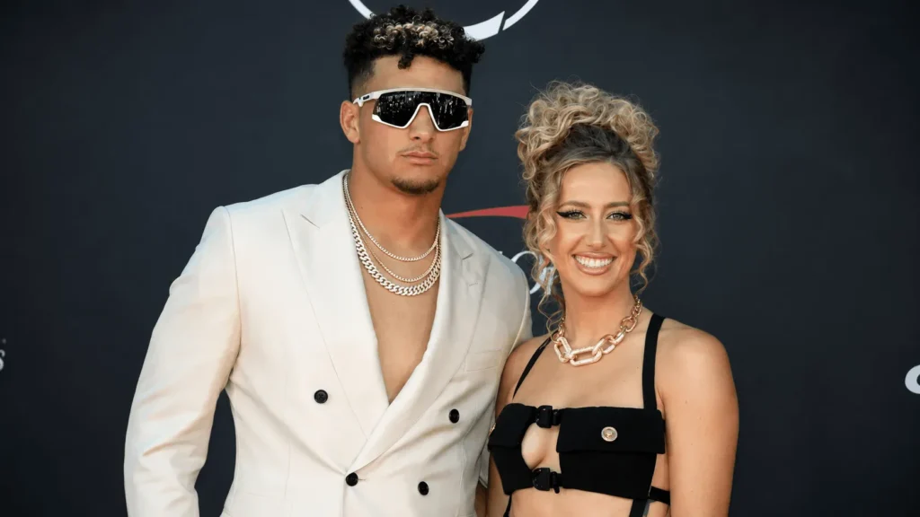 Couple planning finances, representing Patrick Mahomes net worth combined with his wife's earnings